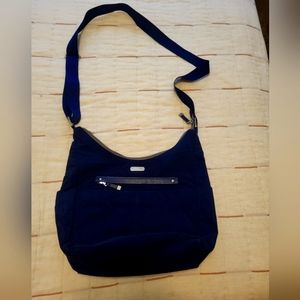 BAGGALINI Crossbody bag, excellent used condition. Dark blue with gray lining.